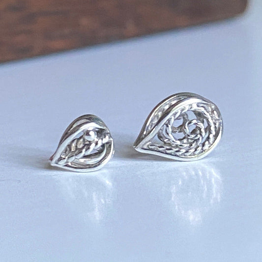 Leaf-shaped beads on a white background